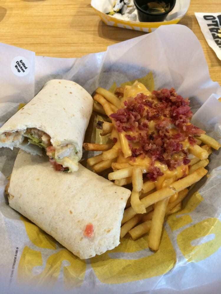 Buffalo Wild Wings Grilled Chicken Wrap
 Cheese and Bacon fries with the Southwest chicken queso