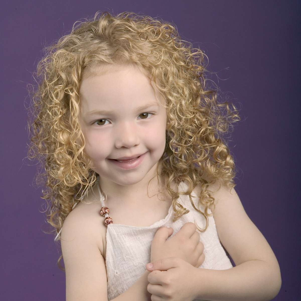 Hairstyle For Little Girl With Curly Hair
 Spiraling curls for a little girl
