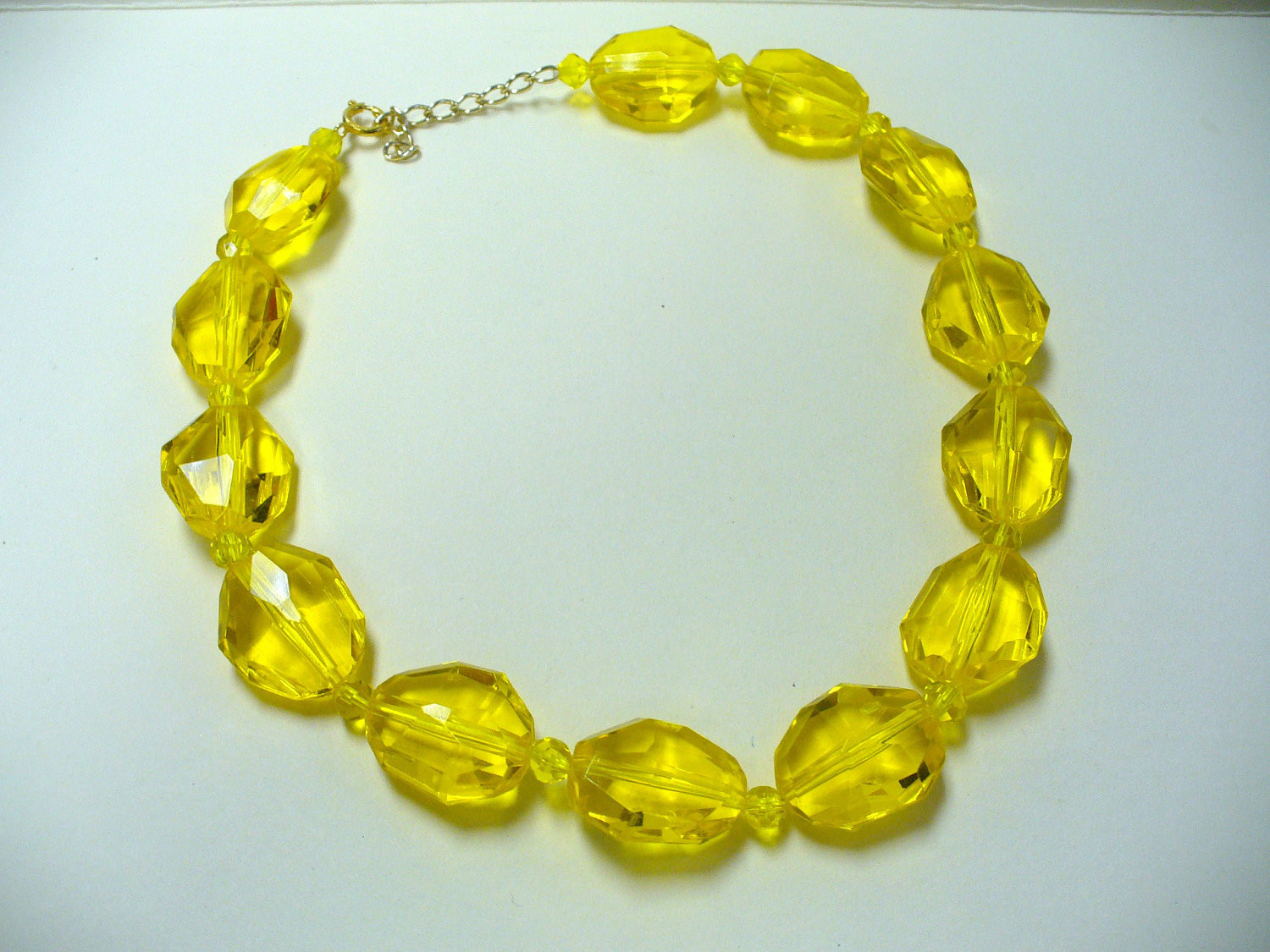 Plastic Bead Necklaces
 Vintage Yellow Plastic Bead Necklace DEADSTOCK