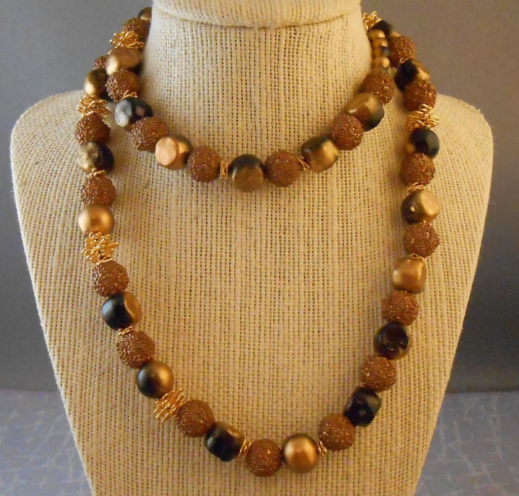 Plastic Bead Necklaces
 Vintage Lucite Plastic Brown & Gold Bead 30" Necklace from