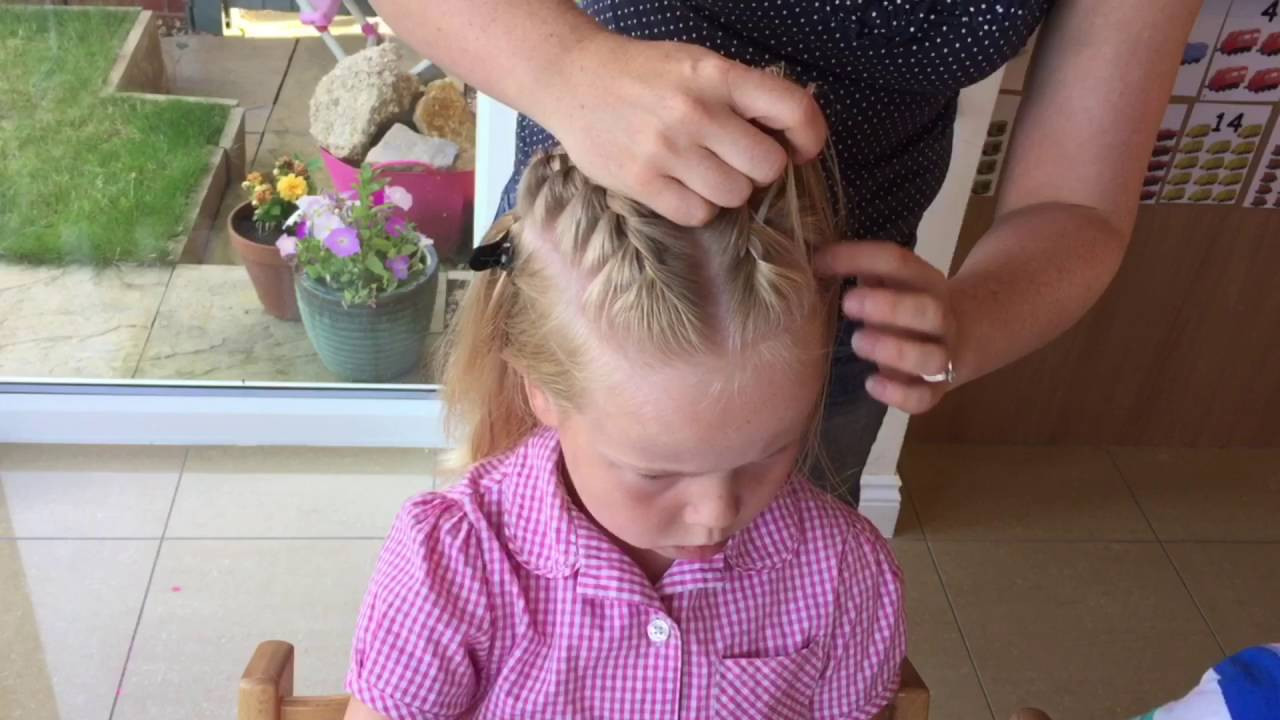 Two Little Girls Hairstyles
 Two French braids into a high messy bun tutorial by Two
