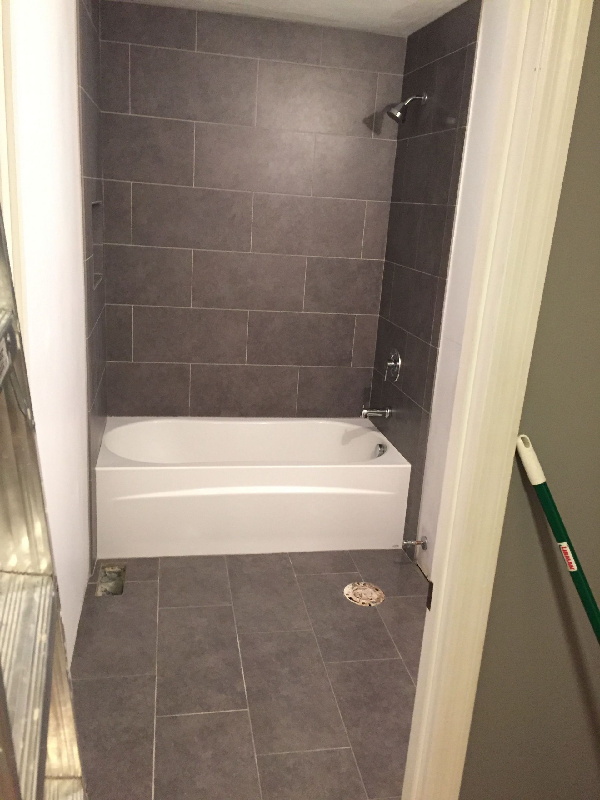 12X24 Tile In Small Bathroom
 Lowe s mitte gray tile 12x24 bathroom tub surround and