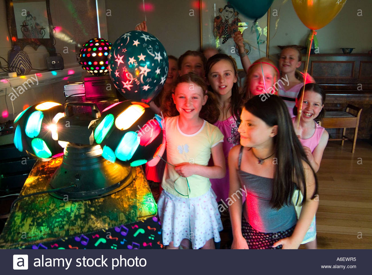 9 Year Old Birthday Party
 9 year old girls at disco birthday party Stock