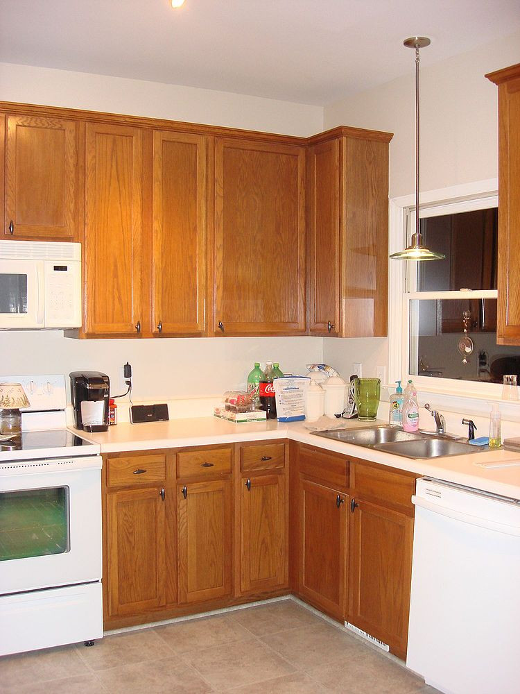 Are Oak Kitchen Cabinets Outdated
 Old Oak Cabinets Painted White and Distressed