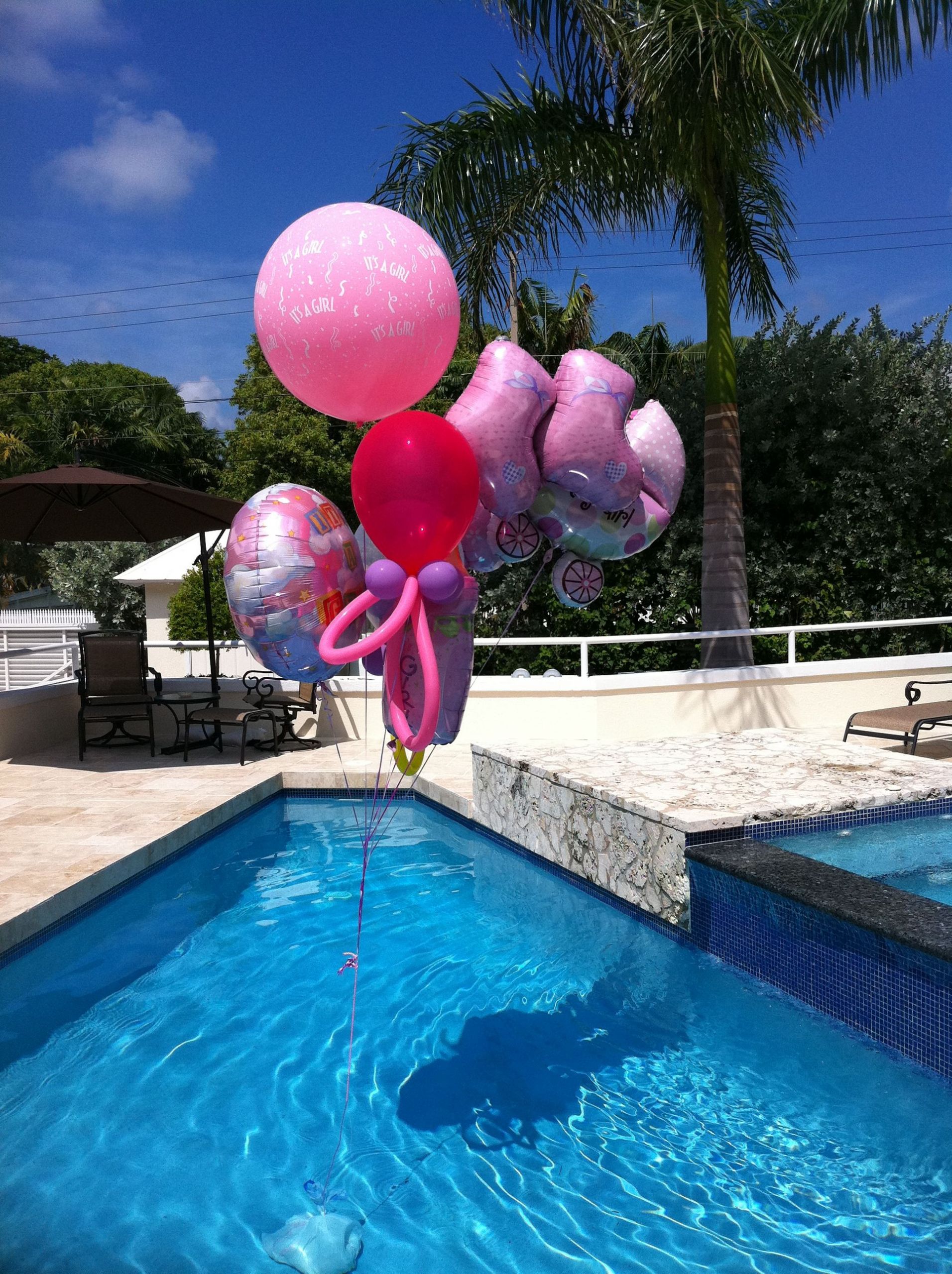 Baby Shower Pool Party Ideas
 Baby shower balloon bouquet over a pool