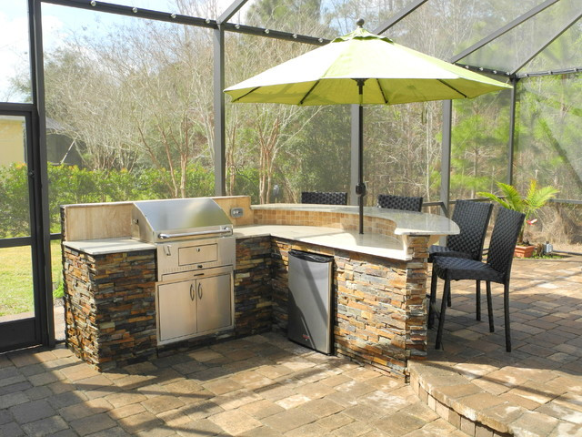 Backyard Bar And Grill
 Outdoor Kitchen with curved bar and charcoal grill