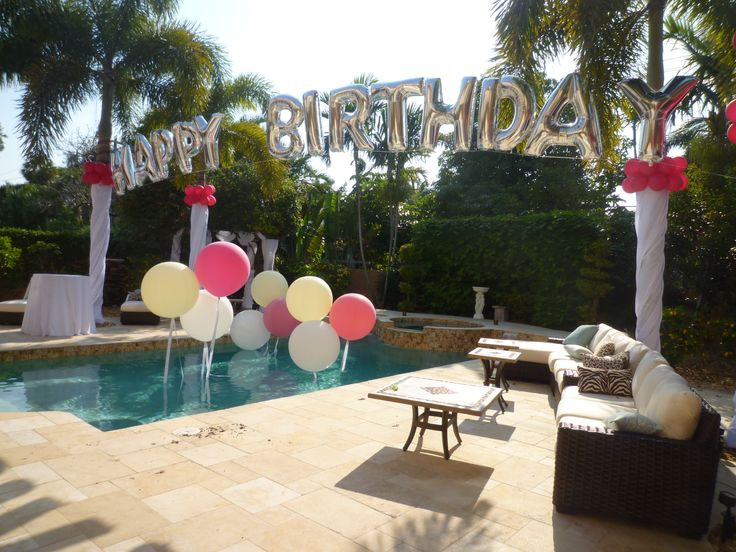 Backyard Party Decorating Ideas
 Birthday balloon arch over a swimming pool Backyard party