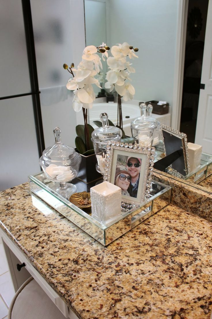 Bathroom Counter Decorating Ideas
 Decorating your bathroom with crystal pots becoration