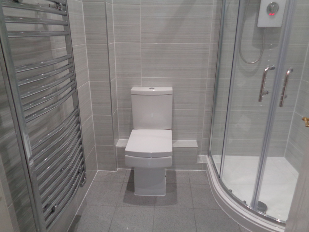 Bathroom Tile Shower
 Bath Conversion to Shower and Starlight Quartz Floor Tiles