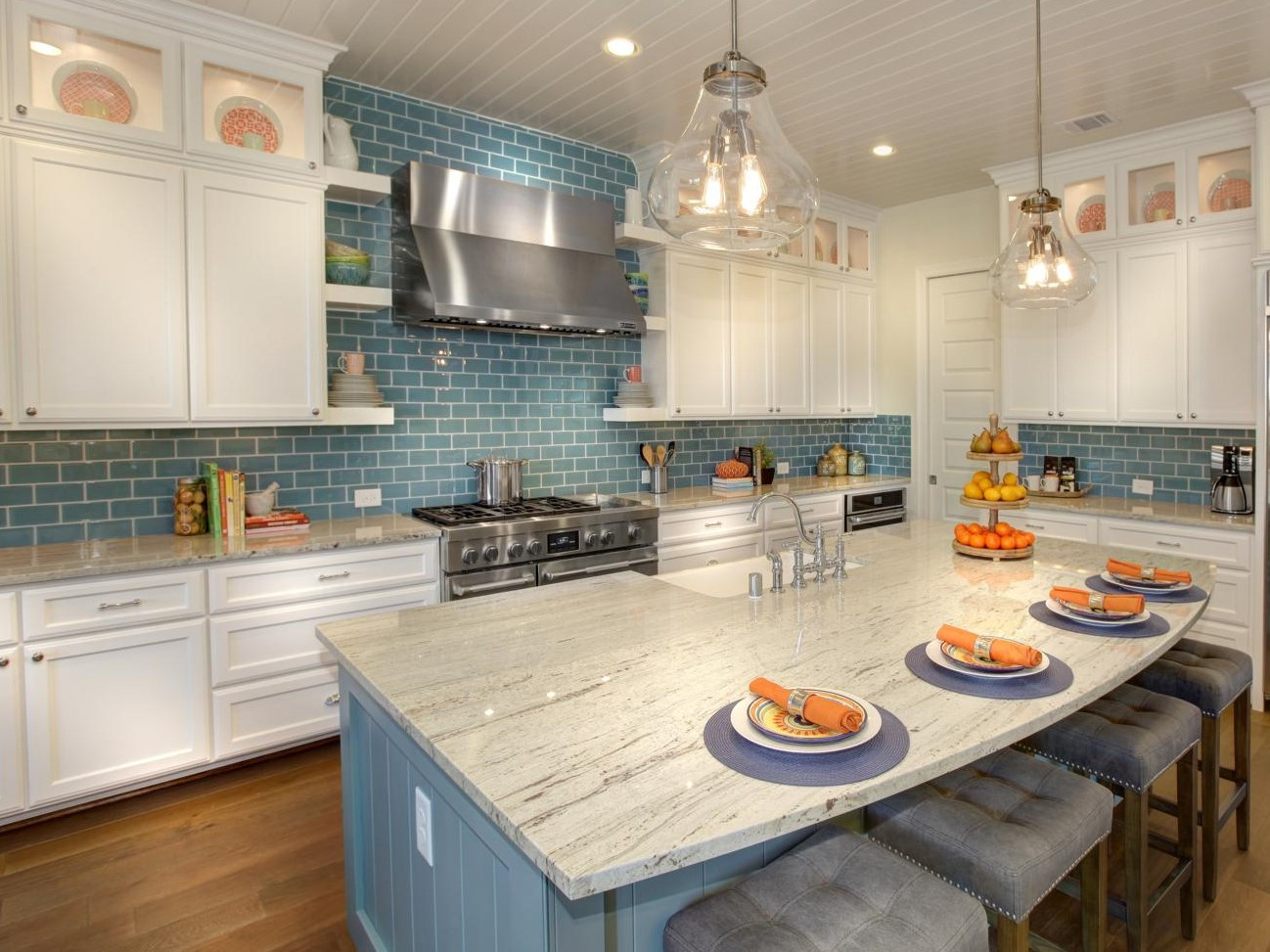 Blue Kitchen Tiles
 White kitchen cabinets with blue subway tile backsplash