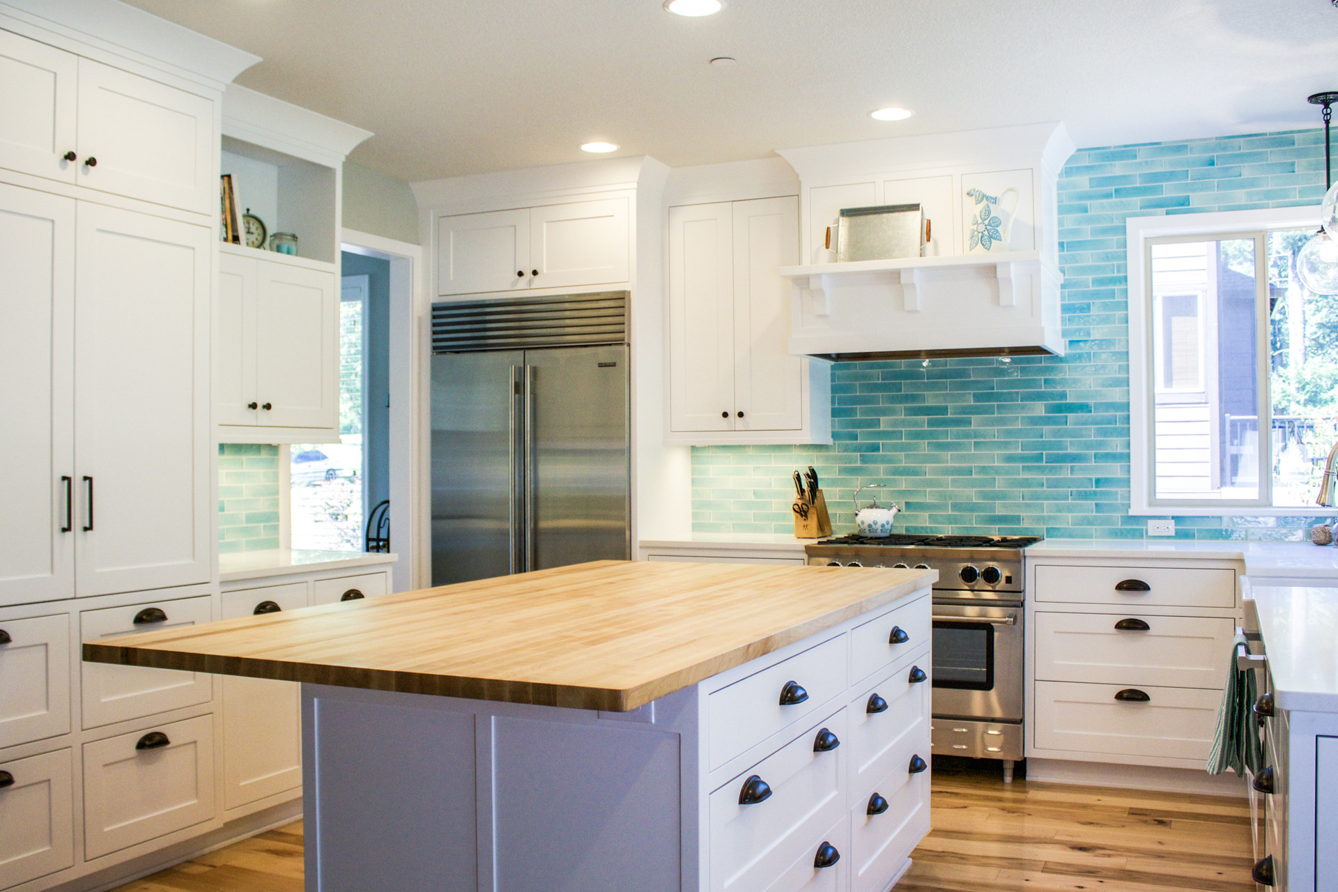 Blue Kitchen Tiles
 Custom designed kitchen with white cabinets and bold blue