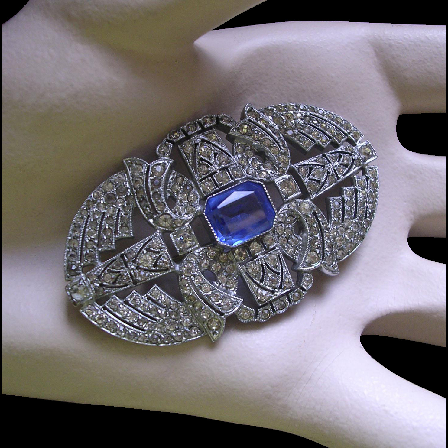 Brooches Art
 Art Deco Sapphire Rhinestone Brooch from bygonebeauties on