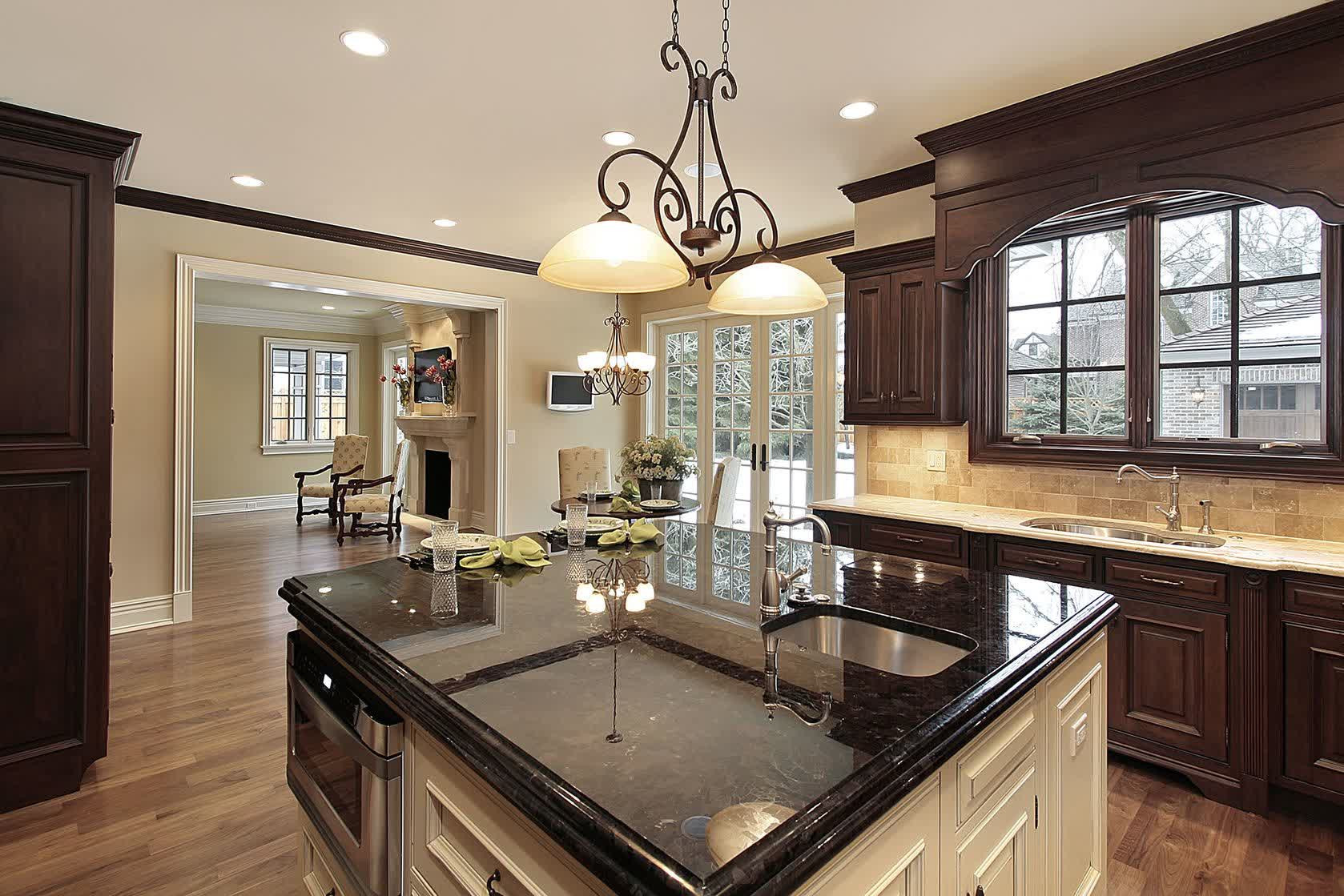 Brown Countertop Kitchen
 Brown Laminated Wooden Floor With Cream Laminated Wooden