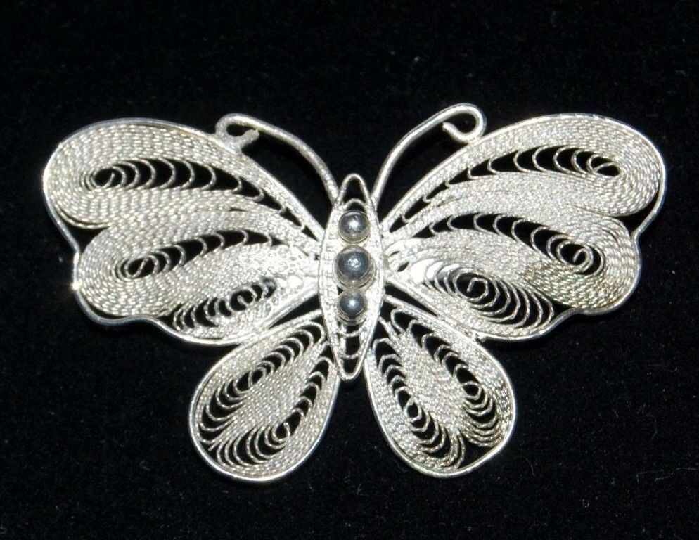 Butterfly Brooches
 Vintage Silver Tone Rolled Wire Butterfly Brooch