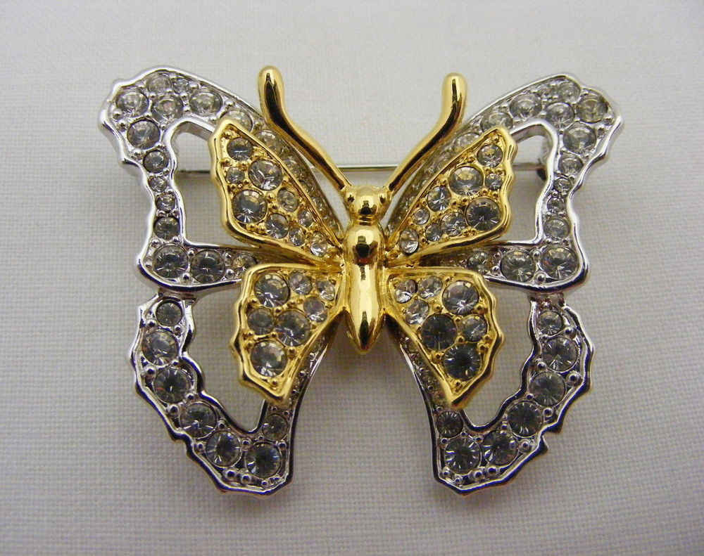 Butterfly Brooches
 Nolan Miller Gold Tone Butterfly Pin Brooch Crystal