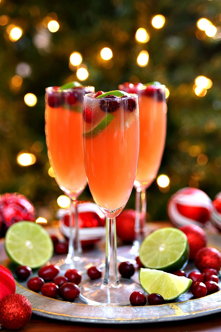 Christmas Drink Recipes
 Christmas Mimosas Holiday Cocktail Recipe Happy Go Lucky
