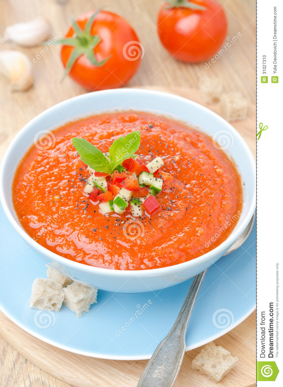 Cold Tomato Soup
 Cold Tomato Soup Gazpacho With Basil In A Bowl Top View
