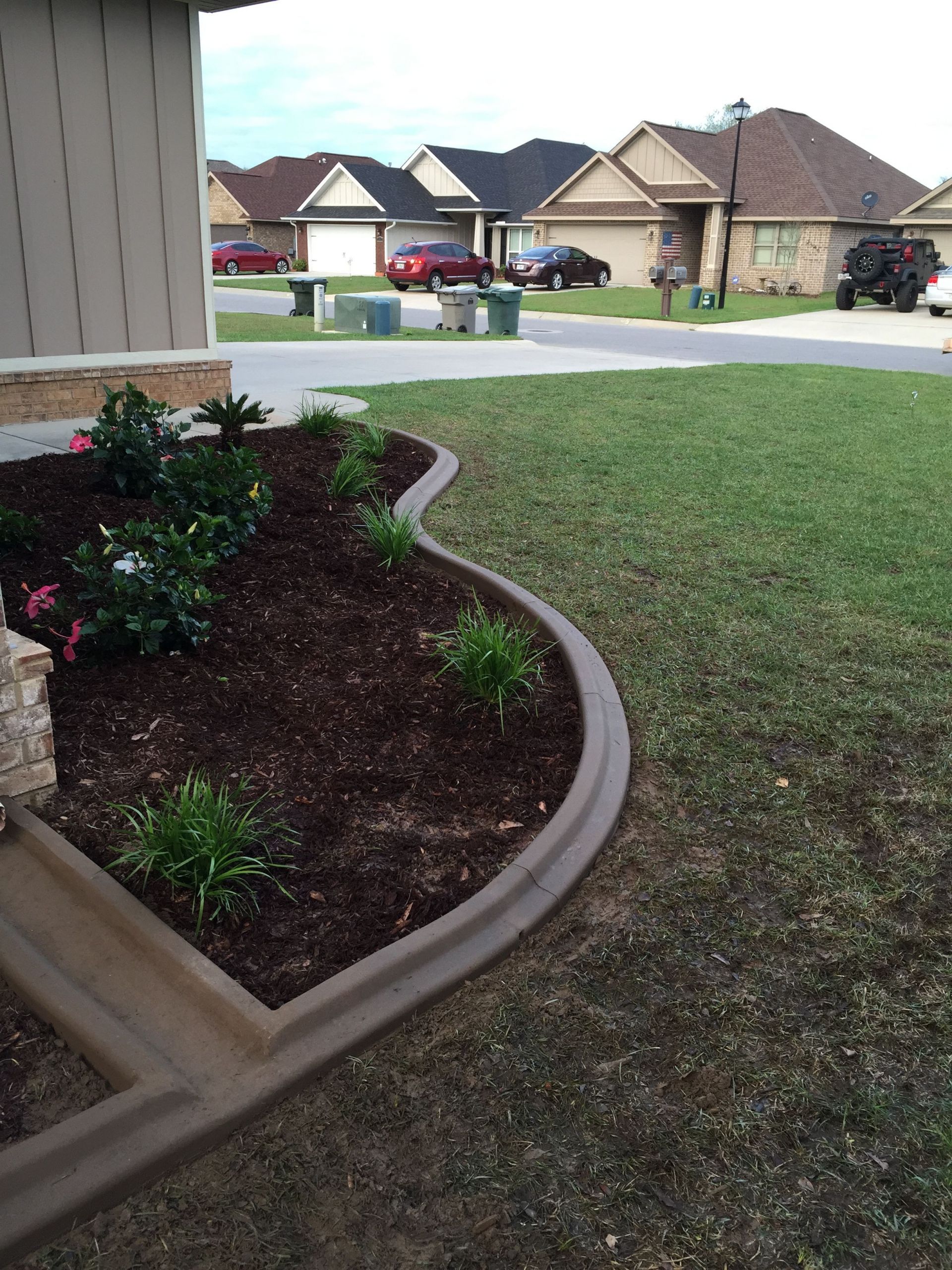 Concrete Landscape Edging Blocks
 Mowers Edge with a splash block added in Awesome