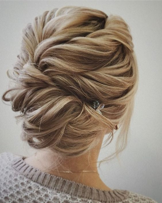 Cool Updo Hairstyles
 Picture twisted braided updo with a cool texture and a