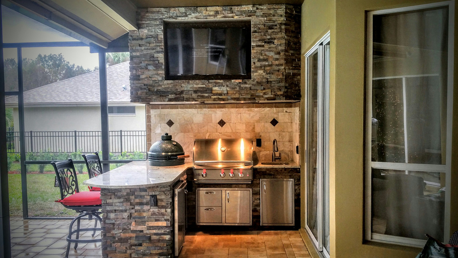 Creative Outdoor Kitchens
 Granite and stonework Outdoor Kitchen with Entertainment