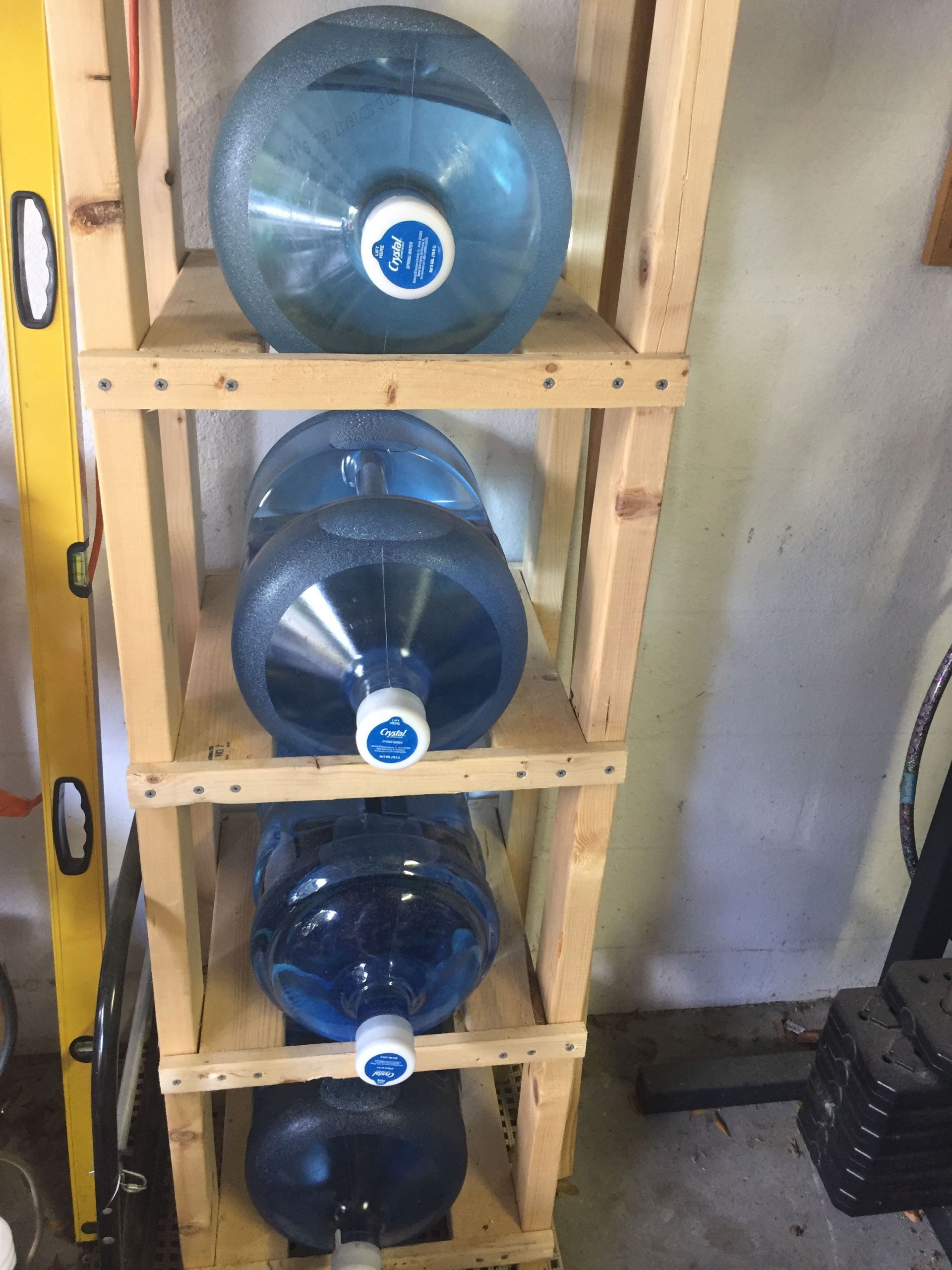 DIY 5 Gallon Water Bottle Rack
 5 gallon water jug storage shelf