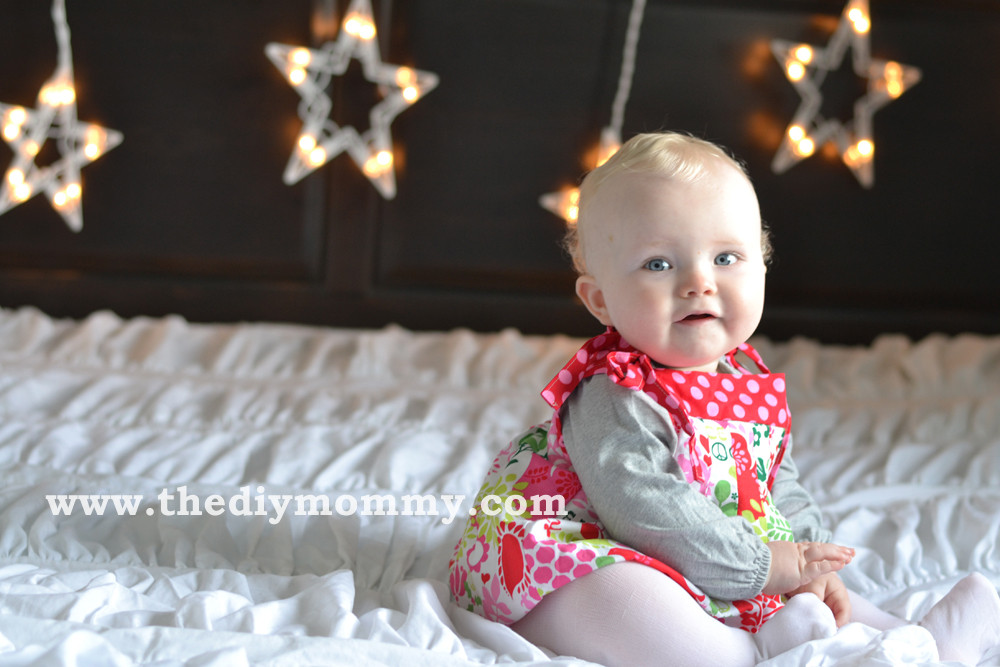 DIY Baby Christmas Photos
 Make DIY Christmas Backdrops with Twinkle Lights