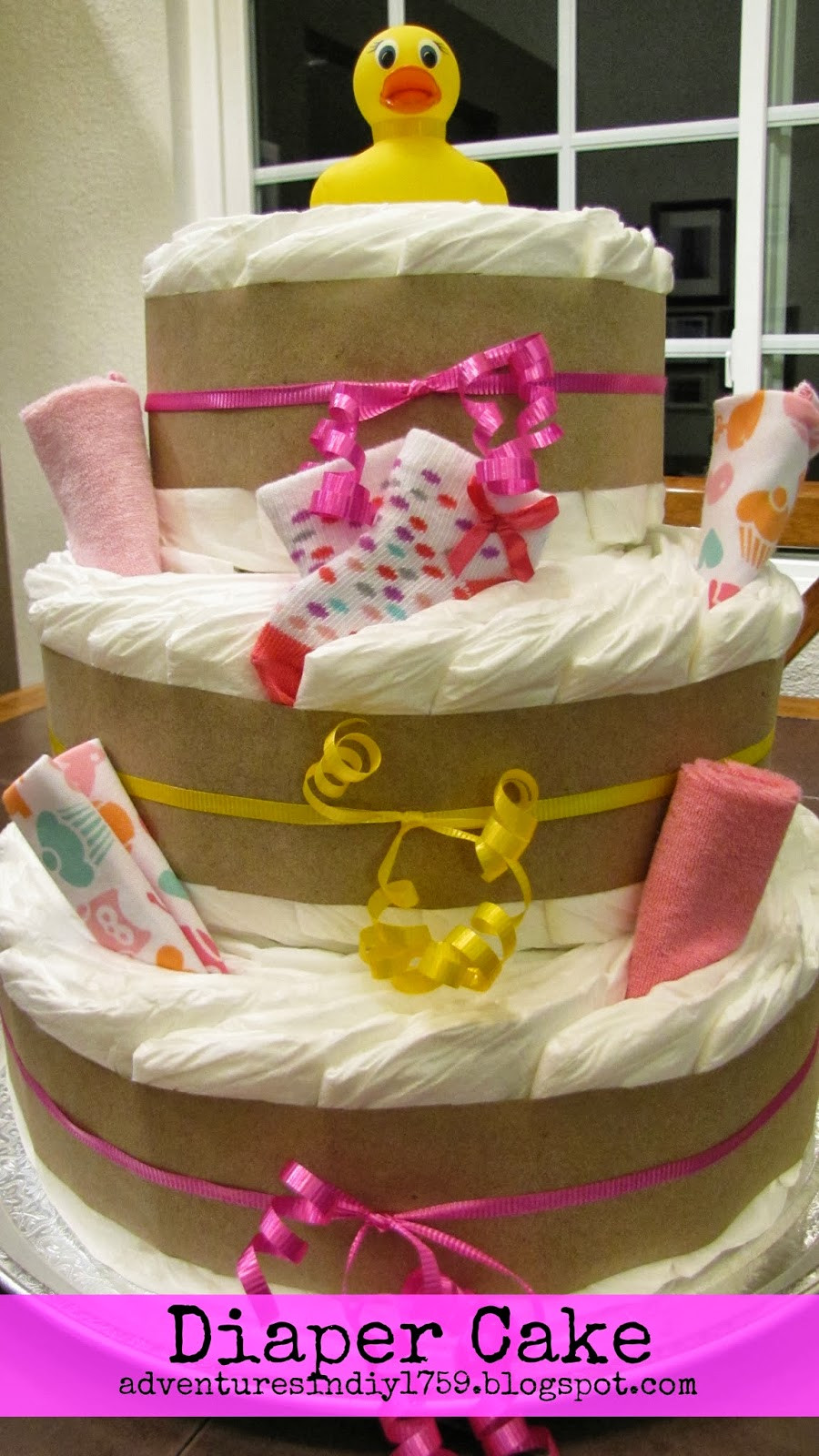 DIY Baby Diaper Cake
 Adventures in DIY Baby Shower Diaper Cake