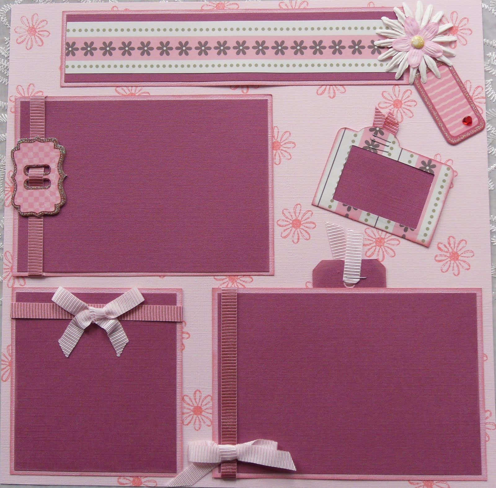 DIY Baby Scrapbook
 DIY pre made baby girl scrapbook page layouts