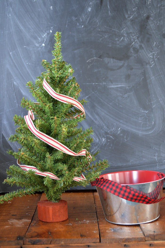 DIY Christmas Tree Stand Bucket
 TURN A GALVANIZED BUCKET INTO A MINI TREE STAND Mad in