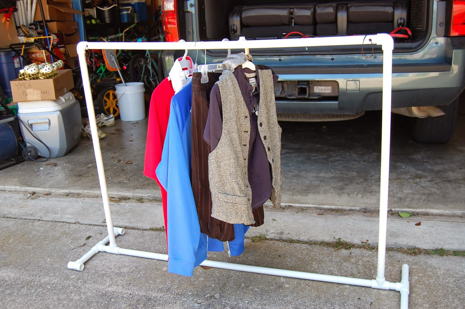 DIY Clothes Rack Cheap
 Blessed With Boys Easy DIY PVC Clothes Rack