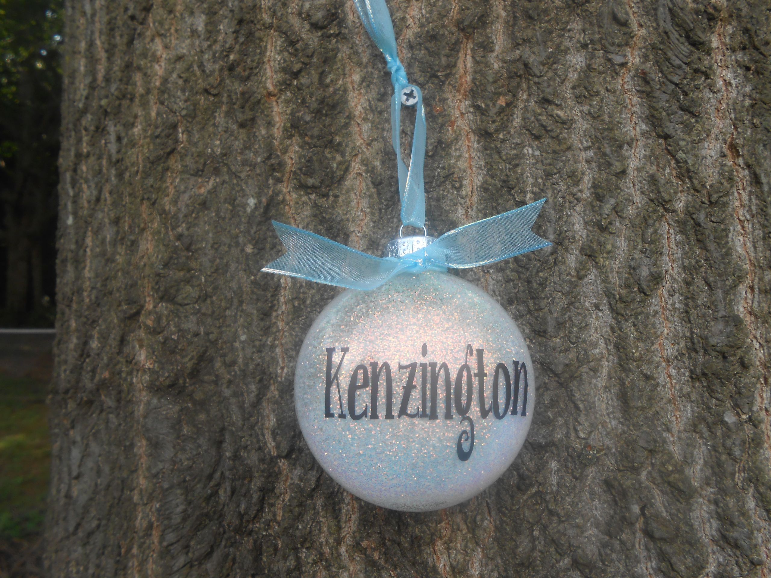 DIY Glitter Ornaments With Hairspray
 hairspray and glitter ornament personalized with my