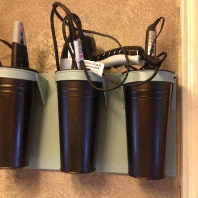 DIY Hair Dryer And Curling Iron Holder
 I used a garden flower holder for my curling irons hair