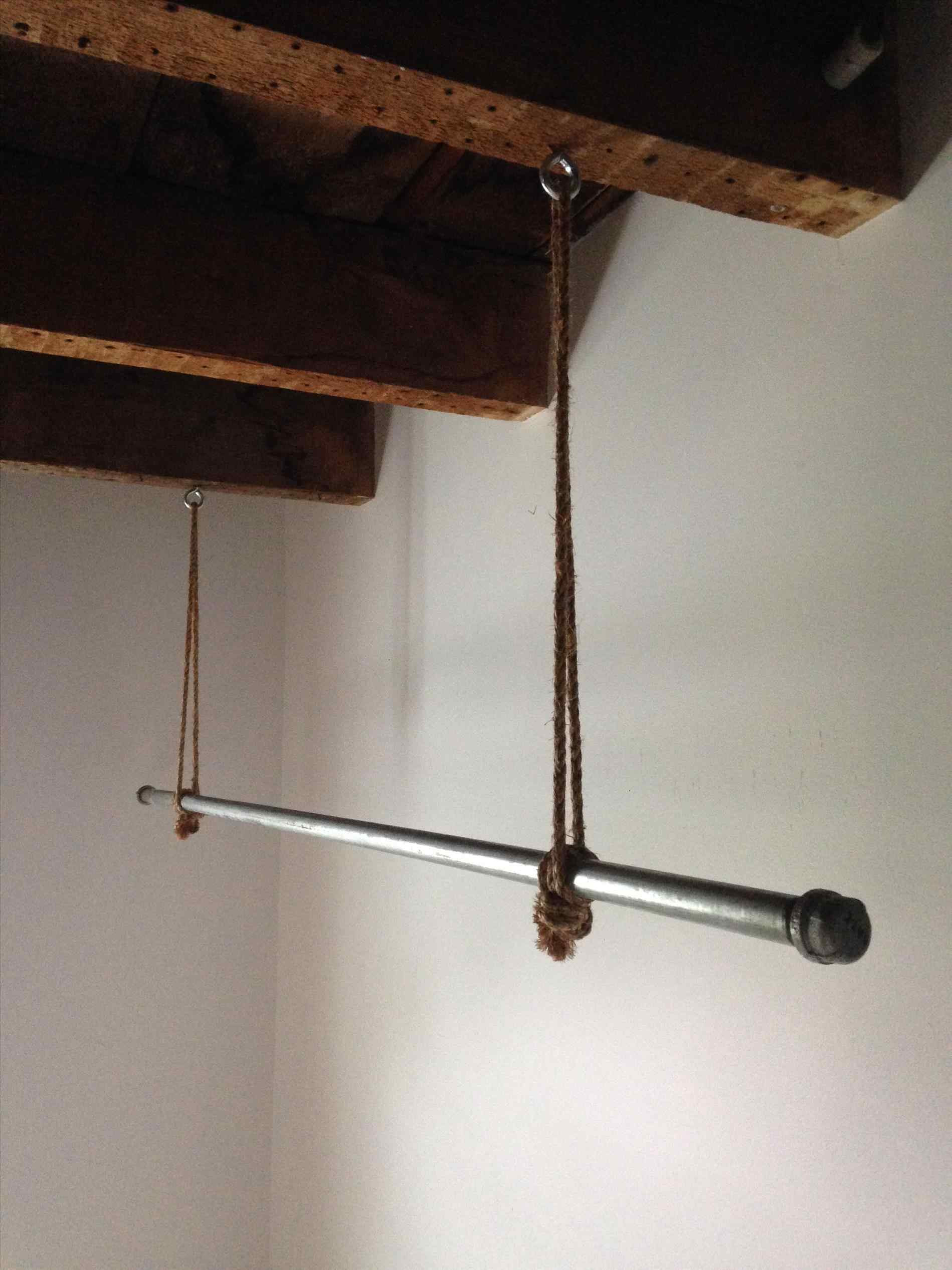 DIY Hanging Clothes Rack From Ceiling
 Clothes Rod From Ceiling Solution To A Closetless Room