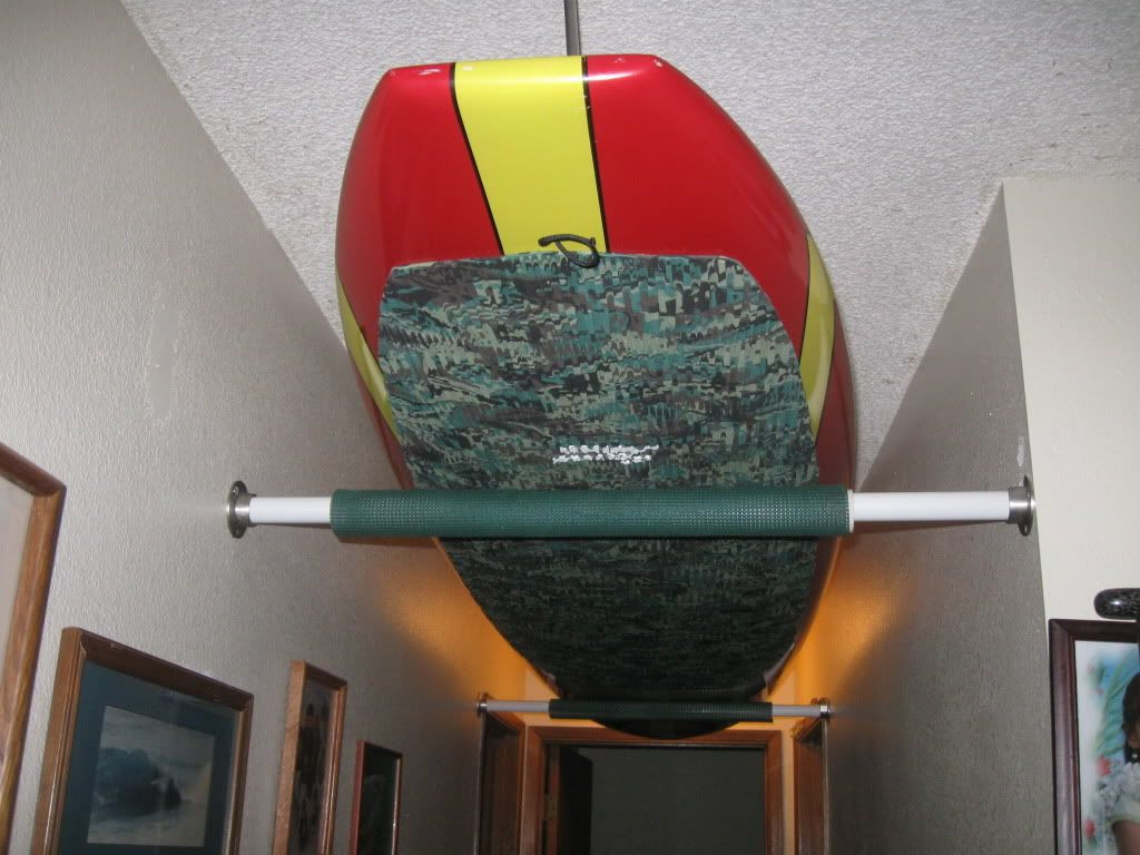 DIY Kayak Rack Ceiling
 paddleboard ceiling storage idea save so much space and