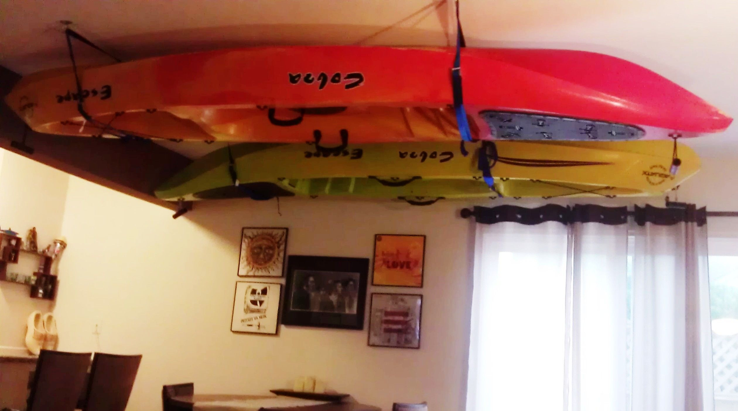 DIY Kayak Rack Ceiling
 Storing kayaks on ceiling = art i Indoor kayak storage