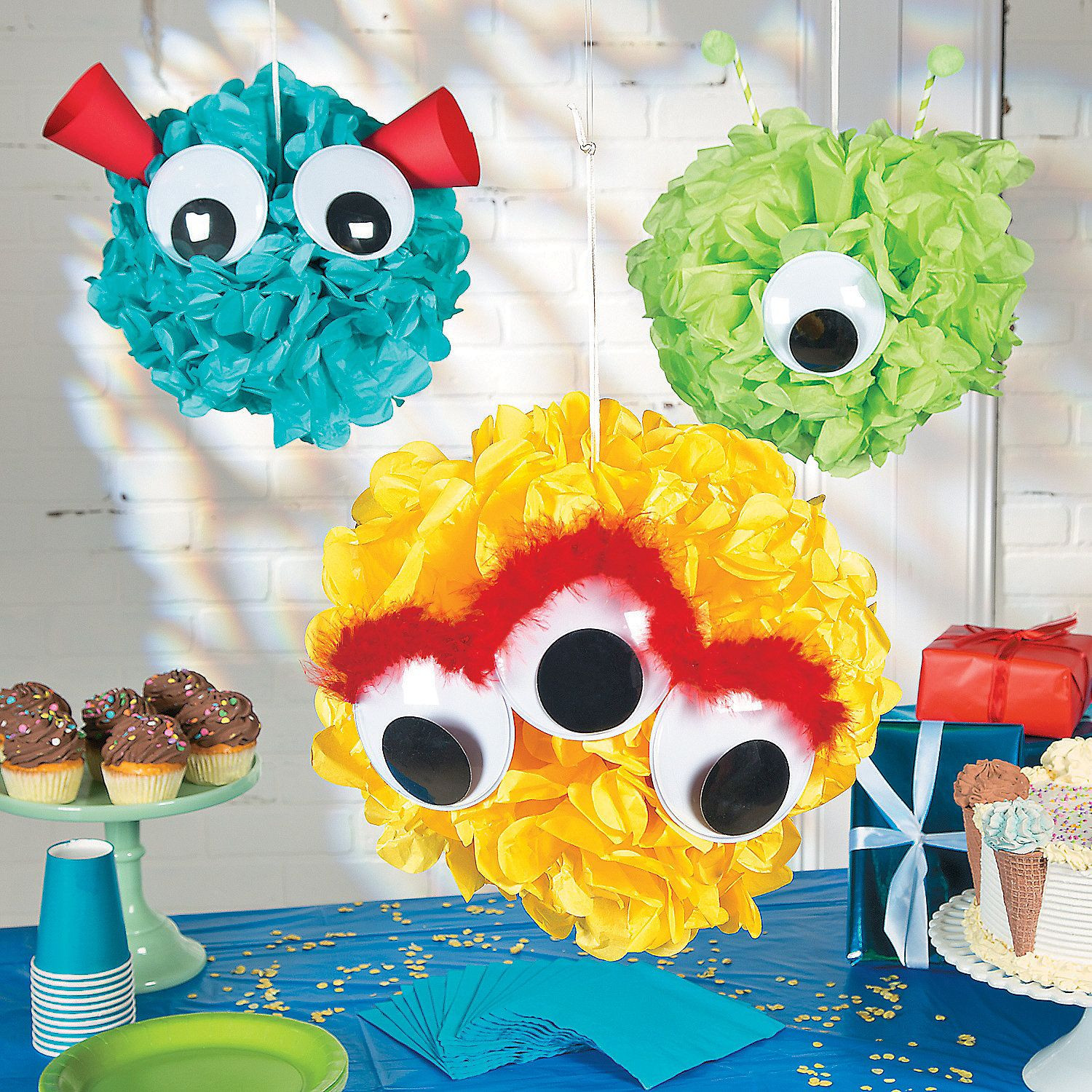 DIY Monster Party Decorations
 Monster Pom Pom Decor Idea