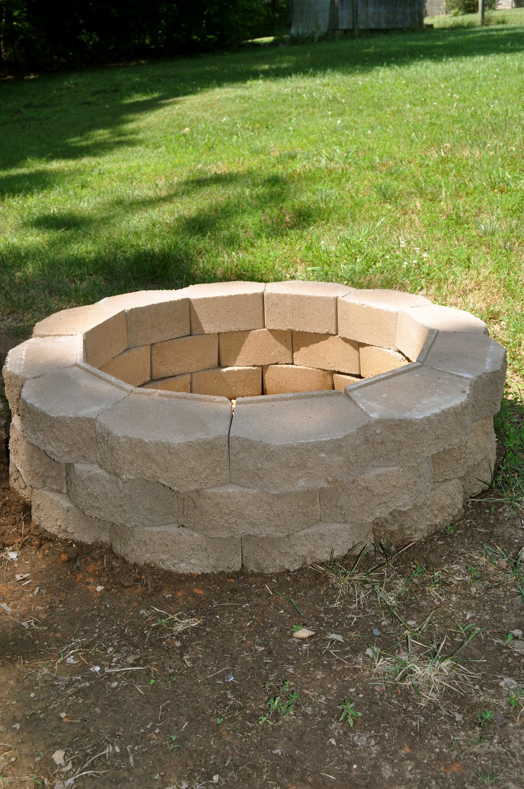 DIY Outdoor Brick Fireplace
 Diy brick fire pit Make Your Own Fire Pit at Home