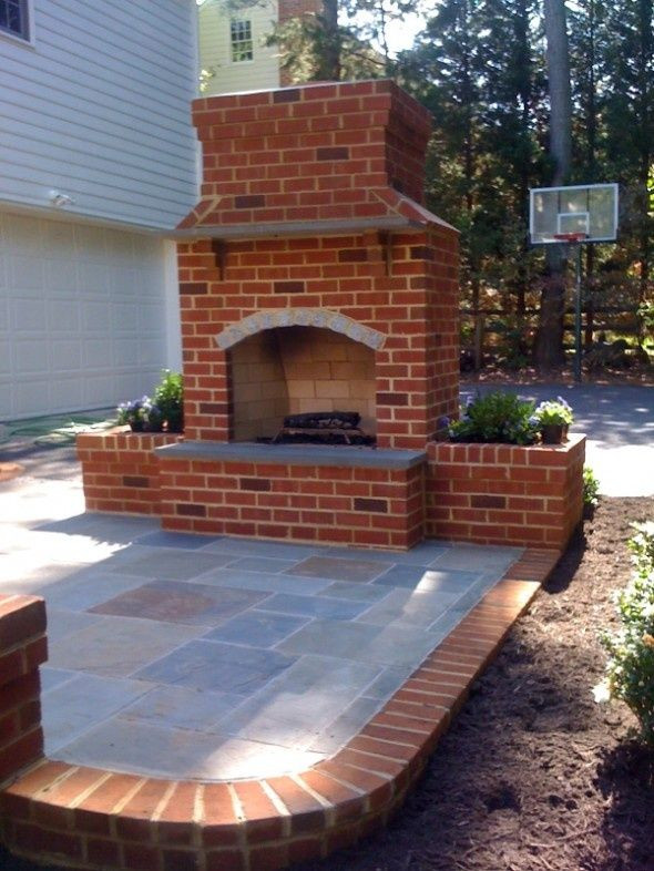 DIY Outdoor Brick Fireplace
 I love outdoor fireplaces Cute idea to go with the