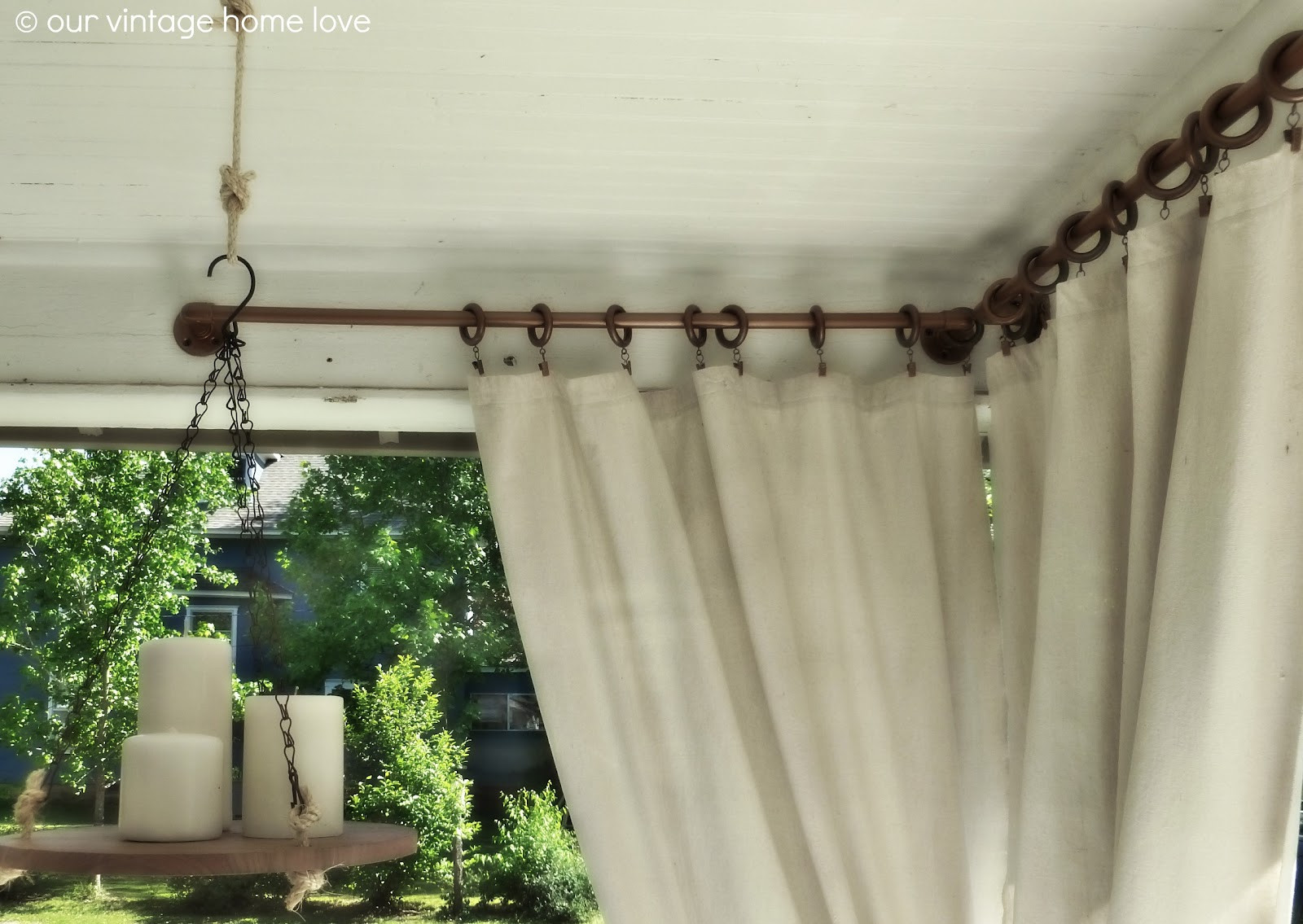 DIY Outdoor Curtain Rod
 vintage home love Back Side Porch Ideas For Summer and An