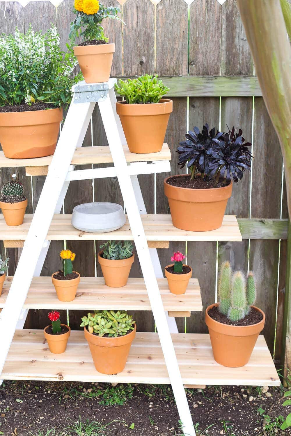 DIY Outdoor Plant Stand
 DIY Tiered Plant Stand From an Old Ladder Love & Renovations