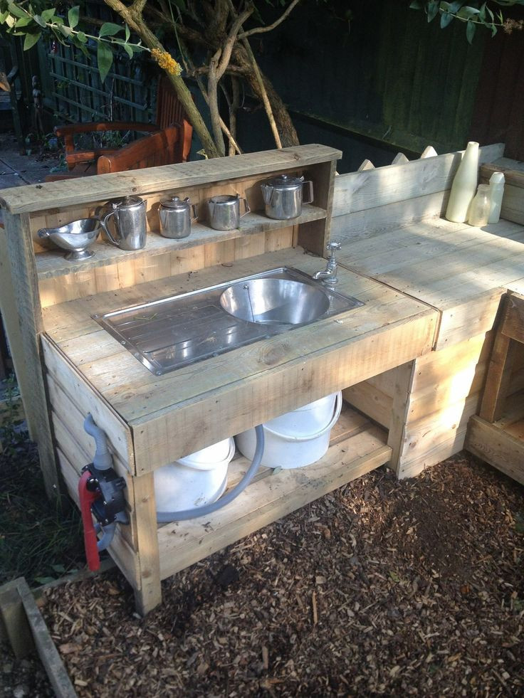 DIY Outdoor Sink Powered By A Water Hose
 Our mud kitchen with running water mud mudkitchen