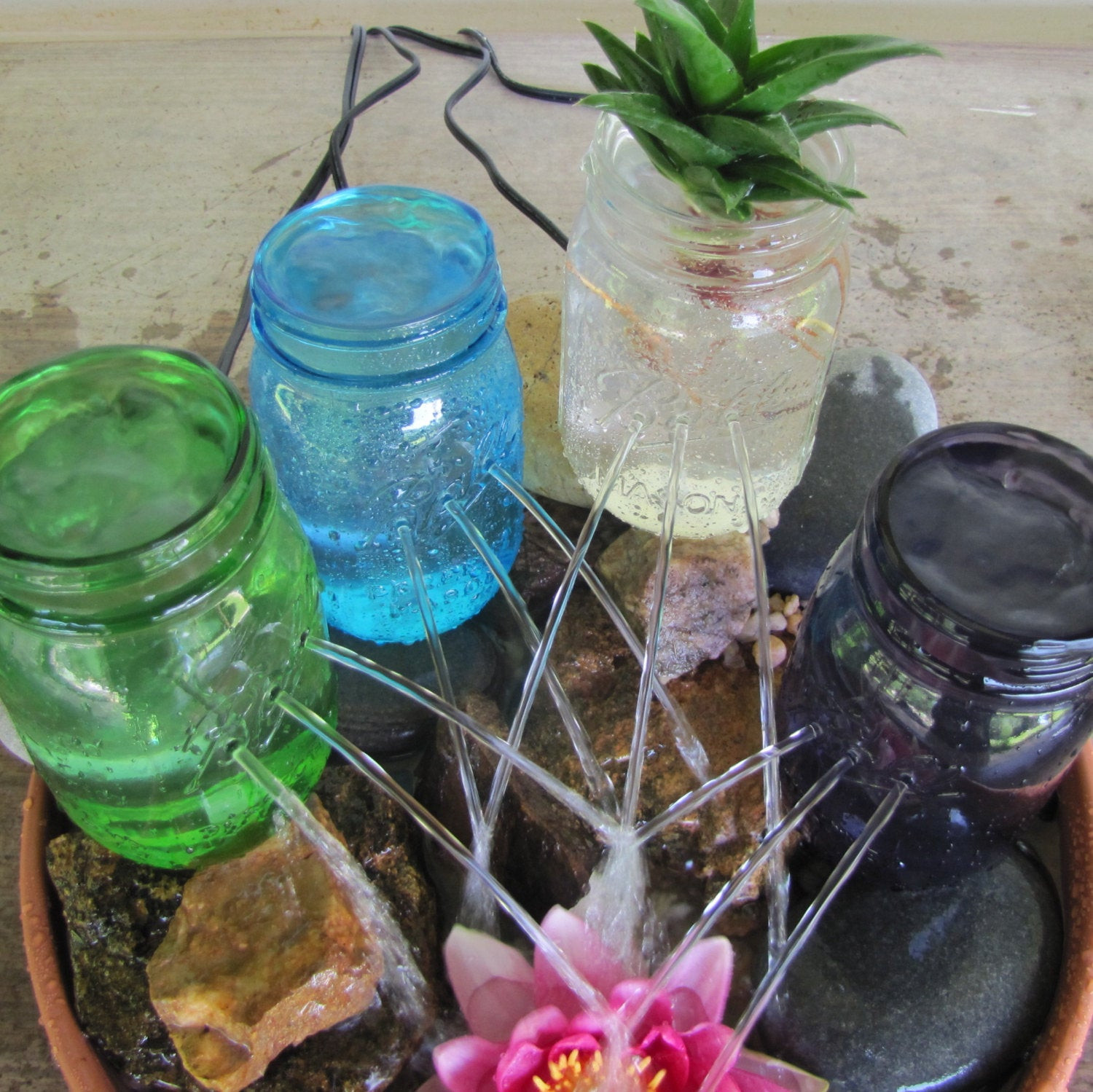 DIY Outdoor Water Fountain Kits
 DIY Mason Jar Water Garden Fountain Kit by CraftInnovation