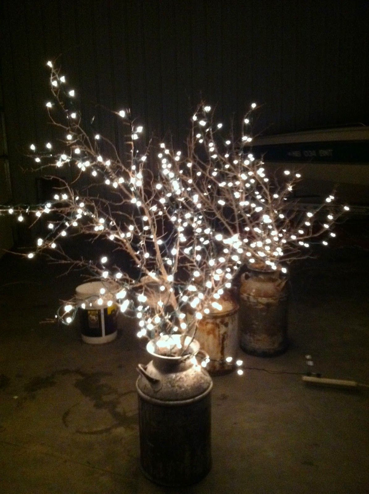 DIY Outdoor Wedding Lighting
 Cheap wedding lighting Use old milk cans branches and