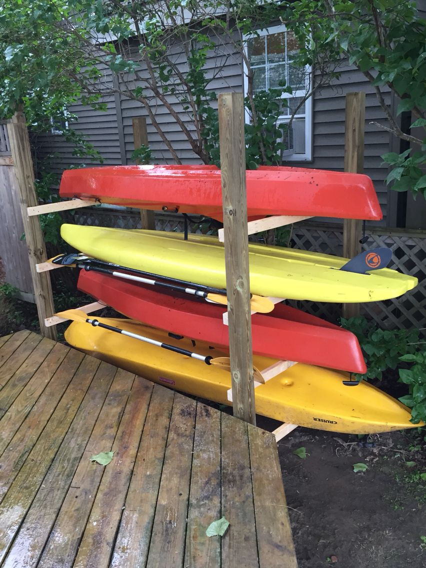 DIY Paddle Board Rack
 Kayak paddle board paddles and small sailboat hull