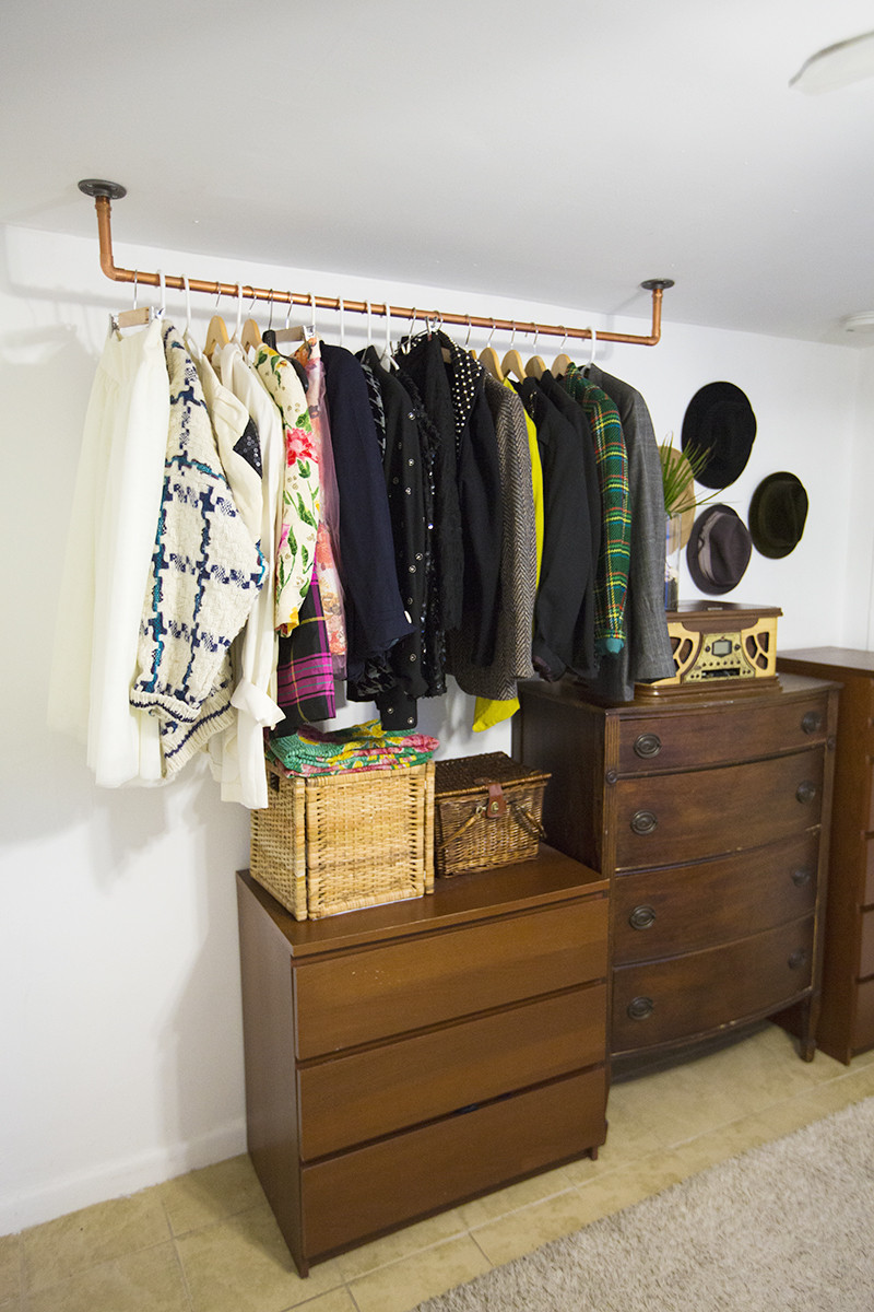 DIY Pipe Clothing Rack
 Hanging Copper Pipe Clothing Rack DIY A Beautiful Mess