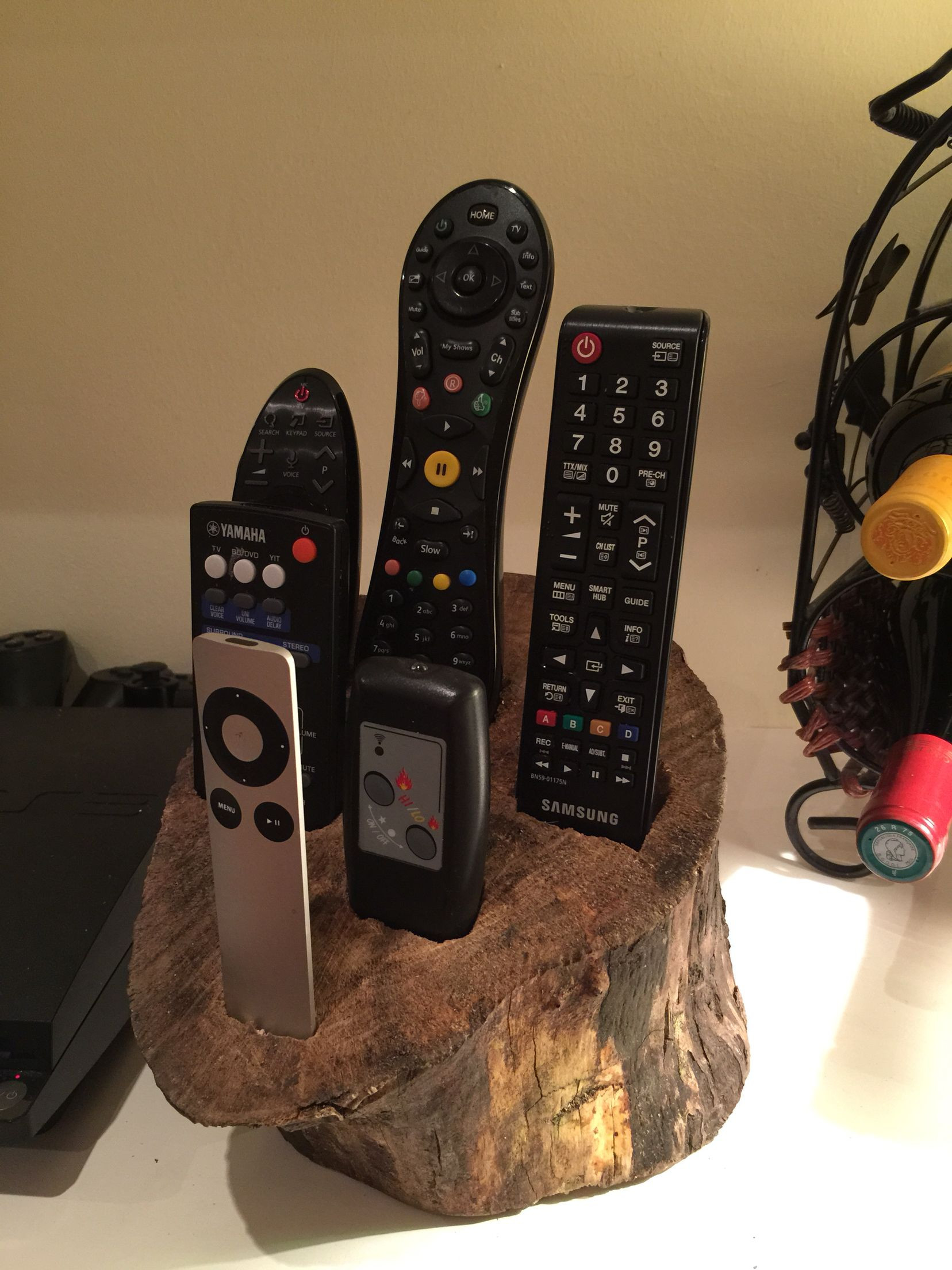 DIY Remote Control Organizer
 Remote control holder out of old log