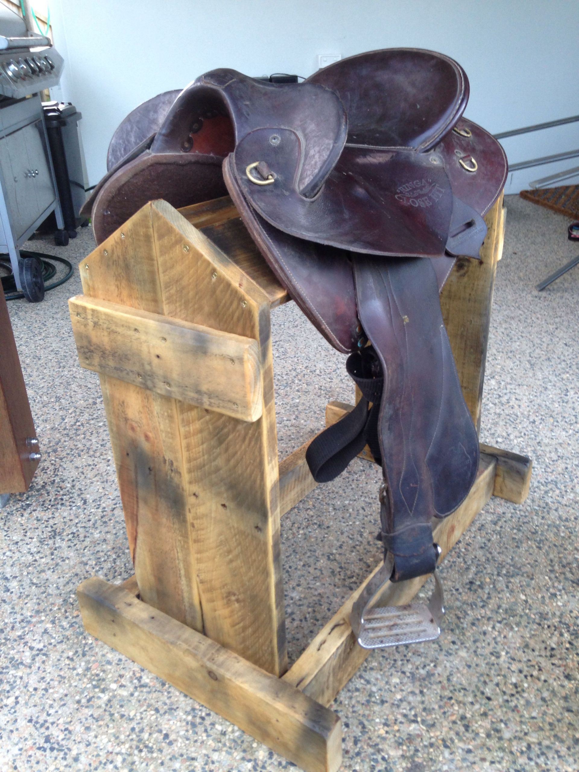 DIY Saddle Rack
 $9 80 for some screws free pallet lid saddle stand