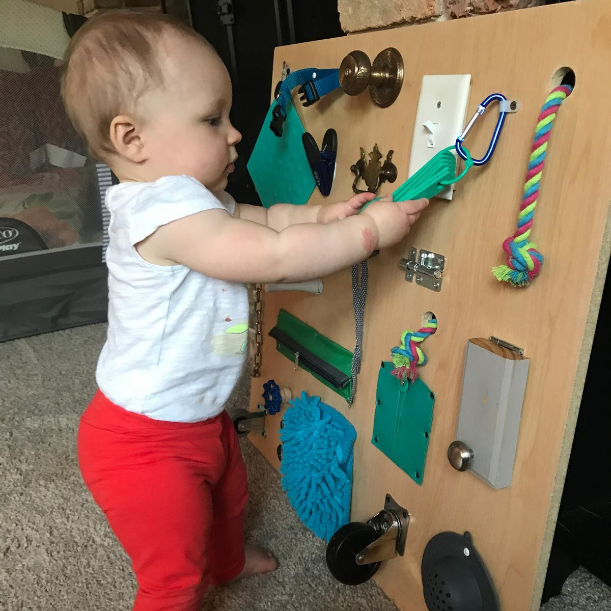 DIY Toddler Busy Board
 Build a Toddler Busy Board with Items You Already Have