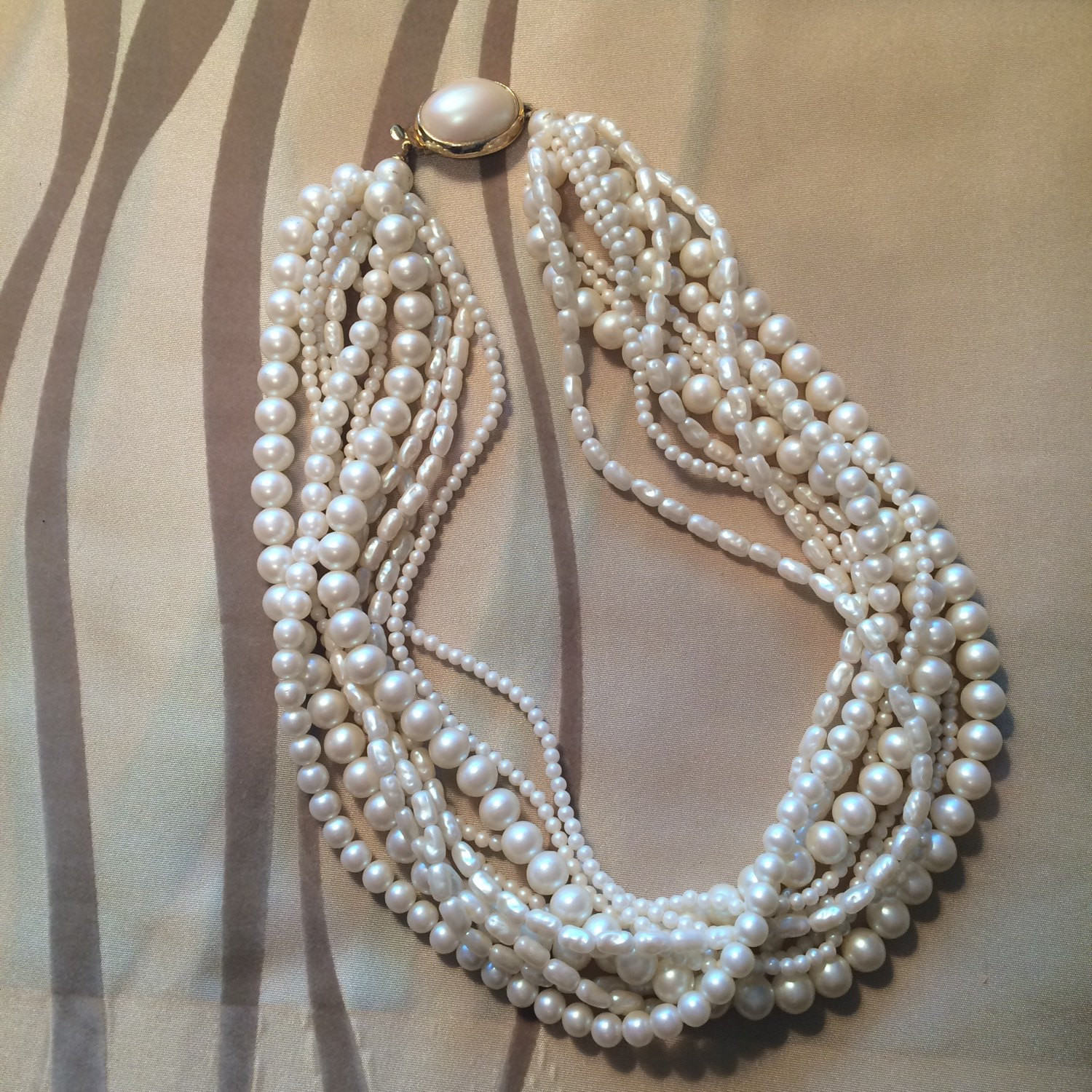 Fake Pearl Necklaces
 Multi Strand Faux Pearl Necklace by OurLadyofCraft on Etsy
