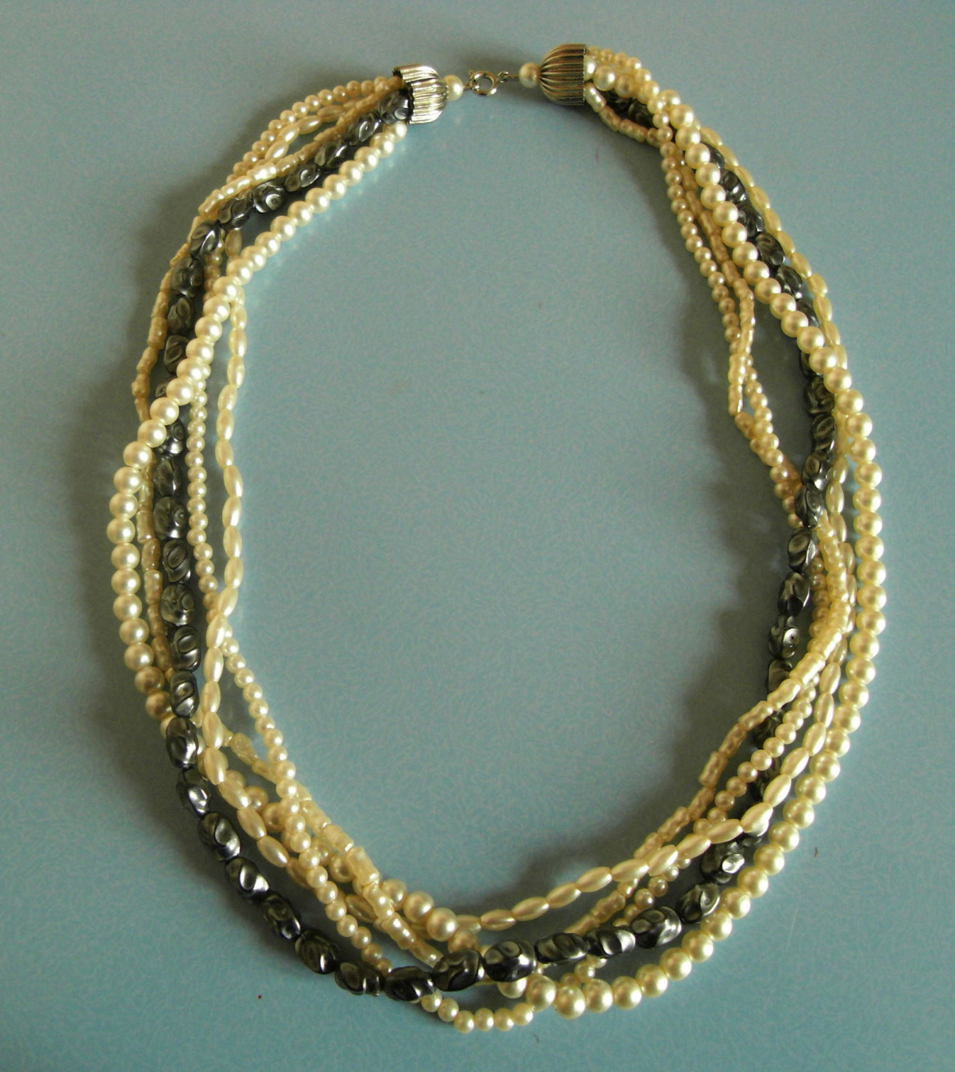 Fake Pearl Necklaces
 Vintage multi strand faux pearl necklace